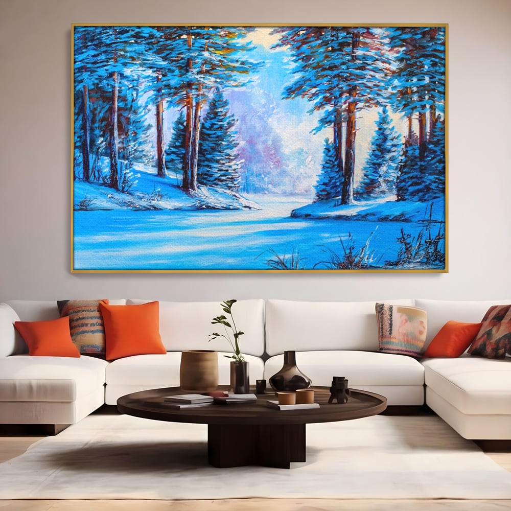Tablou canvas cu pictura peisaj de iarna cu padure si zapada, in rama de aluminiu auriu, pe perete intr-un living